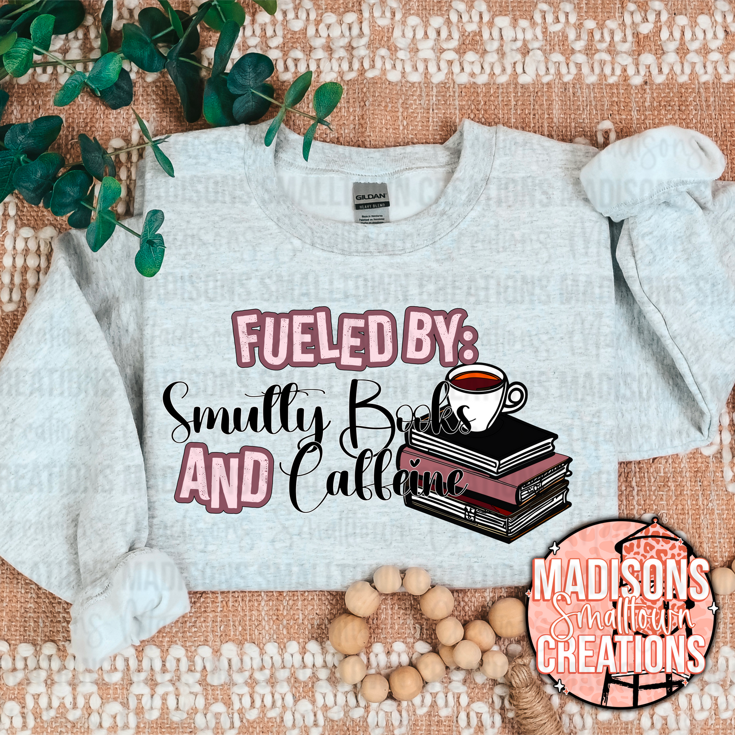 Fueled by smutty books and caffeine crewneck